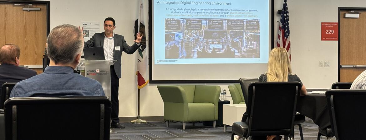 Kavan Hazeli presents the UCR Advanced & Integrated Manufacturing Hub to manufacturing and industry leaders at the MCIE annual meeting.